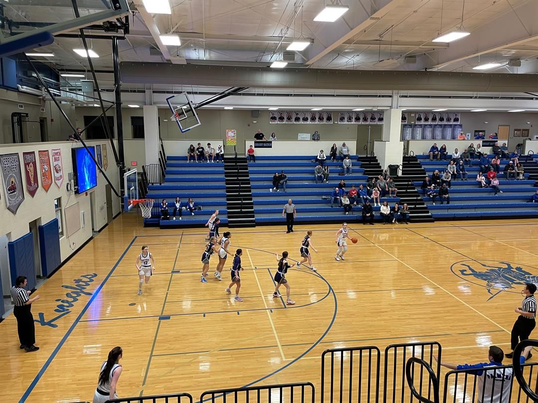 Rylie Walter (Palmyra) dribbles left in the opening game of the C2-2 subdistrict against Louisville.