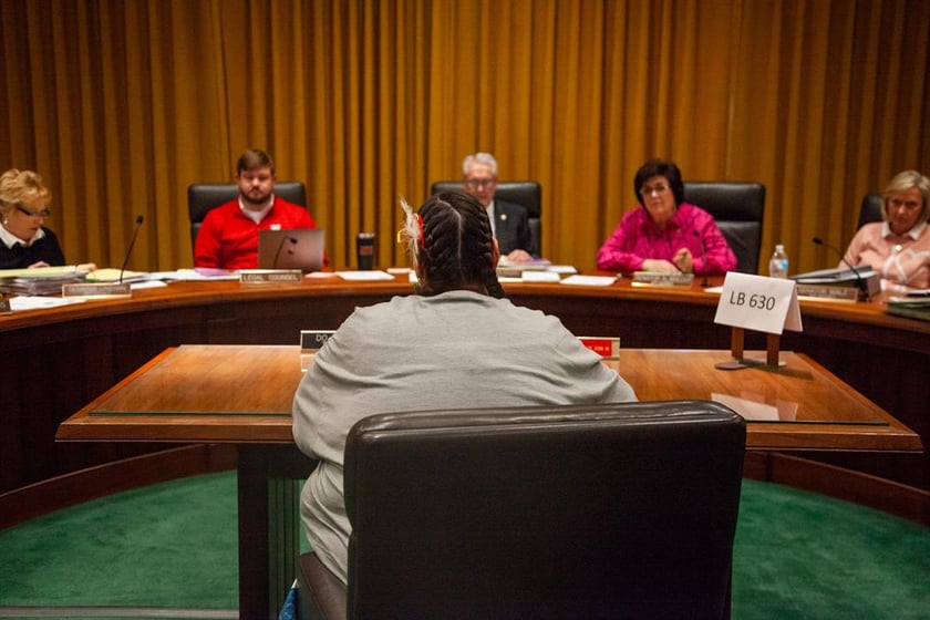 Alice Johnson sits before the Nebraska Legislature’s Education Committee on Feb. 13, 2023.