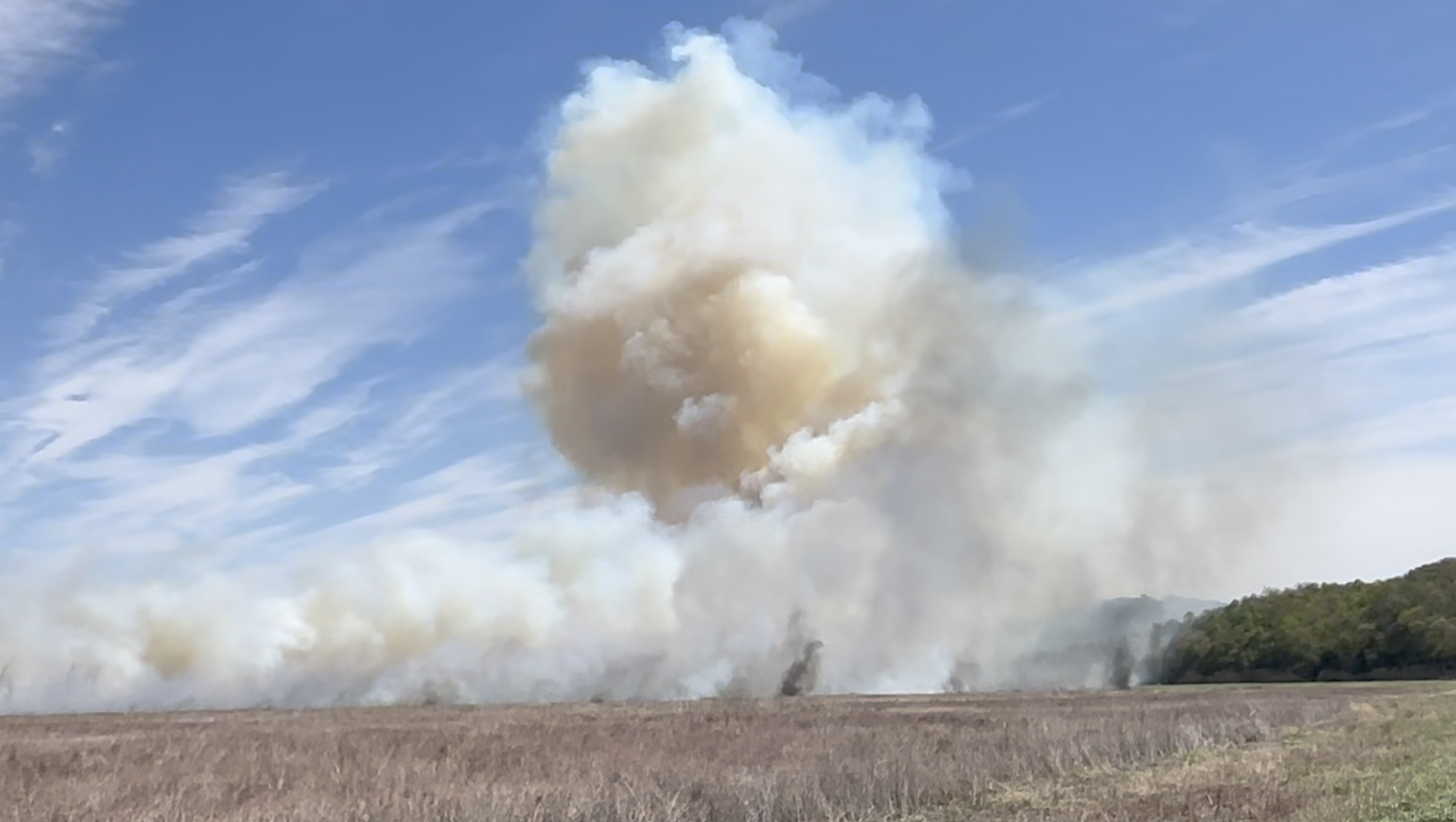 Multiple departments battling grass fire - Vimarsana News