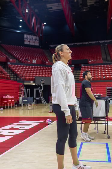 Assistant coach Jordan Larson takes in practice.