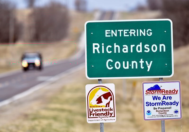 A road sign on Nebraska State Highway 105 welcomes travelers to Richardson County, where the union representing the county's road maintenance workers is in an extended dispute with the county over pay and benefits.
