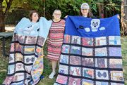 Daughter's artwork sewed in memory quilt